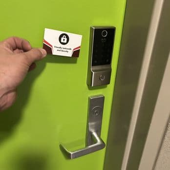 Keypad lock installed on a green door