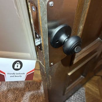 Older door knob and latch hardware being repaired